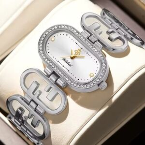 Anthropologie Elegant Silver Watch with Gold Details